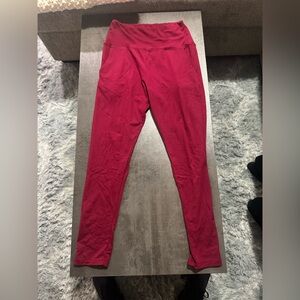 Red high-waisted leggings with pockets. Size medium/large.

#leggingswithpockets